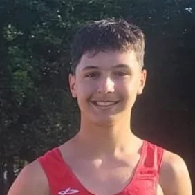 Matei Ventuneac wearing a red rowing vest